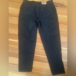 Black Levi’s jeans, tapered, fit in tapered leg, size 22 practically brand new